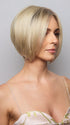 Model is wearing AYUMI by NORIKO in color Light Ash Blond R | Cream Ash Blonde with ash brown and white-grey roots that blend into a variety of ash blonde tones, including ash pearl blonde, creamy ivory, and pale cream