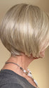 Eileen @crazywiglady is wearing AYUMI by NORIKO in color NM LIGHT ASH BLOND-R | This stunning cream ash blonde features natural-looking ash brown and white-grey roots that blend seamlessly into a variety of ash blonde tones. Woven with ash pearl blonde, creamy ivory, and pale creams, this fashion-forward shade delivers a sophisticated, multi-tonal finish for an elegant ash blonde look.