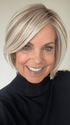 Susan Sparks @sparkles_intheworld wearing STRAIGHT UP WITH A TWIST by RAQUEL WELCH WIGS in color SS19/23 SHADED BISCUIT | Cool Platinum blonde with subtle highlights and medium brown roots