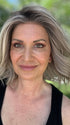 Emily H. @she_sheds_more wearing BERRY by BELLE TRESS in color COOL CHAI BLONDE-R | A balanced cool blonde with softly contrasted darker roots, a fresh twist on classic blonde tones.