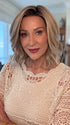 Eileen @crazywiglady is wearing BERRY by BELLE TRESS in color BUTTERCAKE BLONDE-R | A neutral-warm blonde blend featuring light brown, ash, and lightest blonde tones with natural-looking darker roots for added depth and realism.