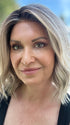 Emily H. @she_sheds_more wearing BERRY by BELLE TRESS in color COOL CHAI BLONDE-R | A balanced cool blonde with softly contrasted darker roots, a fresh twist on classic blonde tones.