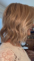 Eileen @crazywiglady is wearing BERRY by BELLE TRESS in color BUTTERCAKE BLONDE-R | A neutral-warm blonde blend featuring light brown, ash, and lightest blonde tones with natural-looking darker roots for added depth and realism.