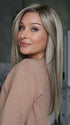 Heather @cjswigs wearing CHAMPION by BELLE TRESS in color SPARKLING CHAMPAGNE R | Medium Ash Brown roots transition into Shimmering Champagne Blonde characterized by Pale Golden Hues with subtle Ivory and Platinum undertones reminiscent of a sparkling glass of bubbly