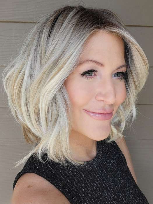 Natalie Gray @vanish.into.thin.hair wearing wearing Mira by Amore in shade SEA SALT BLOND R | A perfect mixture of cool, icy-blond and warm-dark blond. The rich brown root tone enhances the modern appearance.