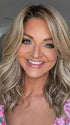 Sandy @i_be_wiggin wearing LAGUNA BEACH by BELLE TRESS in color RAW SUGAR BLONDE | A Neutral Light Blonde, Honey Blonde, Pale Gold Blonde, with a base of Light Brown Low Lights featuring a Medium Root Color