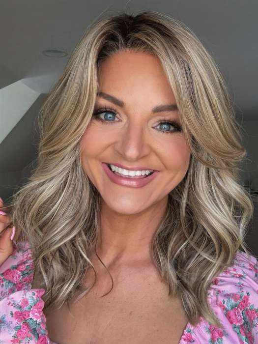 Sandy @i_be_wiggin wearing LAGUNA BEACH by BELLE TRESS in color RAW SUGAR BLONDE | A Neutral Light Blonde, Honey Blonde, Pale Gold Blonde, with a base of Light Brown Low Lights featuring a Medium Root Color