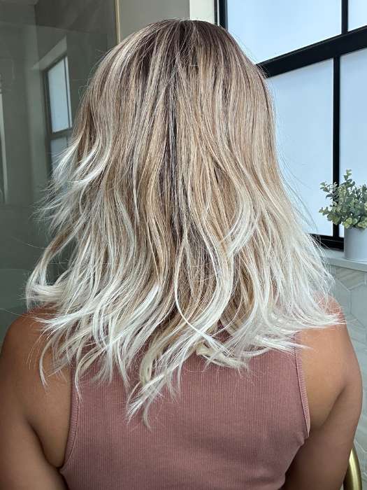 Lorena @faux.hurr.lifee wearing DAZZLING WAVEZ by RENE OF PARIS in shade MELTED MARSHMALLOW | Subtly Warm Dark Sandy Blonde Blend with Medium Brown Roots and Light Ash Blonde Tips and Highlights
