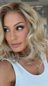 AMANDA by ENVY in color CHAMPAGNE SHADOW | Soft Dark Blonde with Platinum Highlights and Chestnut Roots