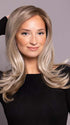 Model is wearing SAVELLI by ELLEN WILLE in color IVORY BLONDE TIPPED 101.15.12 | Dark Neutral Blonde with Pearl Platinum and Pearl White Blend with Lighter Tipped Ends