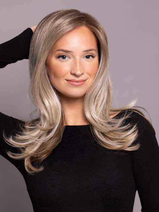 Model is wearing SAVELLI by ELLEN WILLE in color IVORY BLONDE TIPPED 101.15.12 | Dark Neutral Blonde with Pearl Platinum and Pearl White Blend with Lighter Tipped Ends