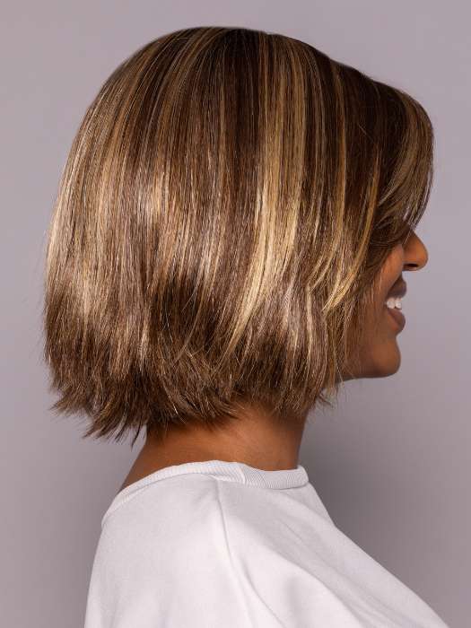 Model is wearing LUMI by ESTETICA in color CKISSRT4 | Golden Brown with Copper Blonde Highlights and Dark Brown Roots