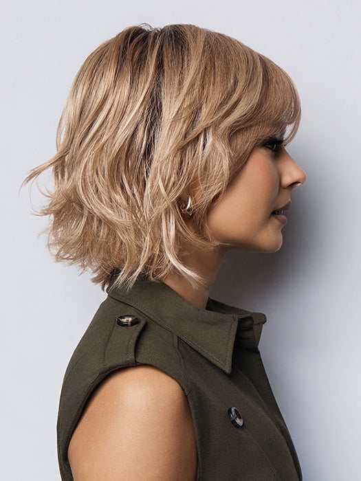 Model is wearing BRANN in SANDY BEIGE BLONDE R | Carefully placed shades of dark sandy blonde and light neutral blonde with medium root tone for added depth.         