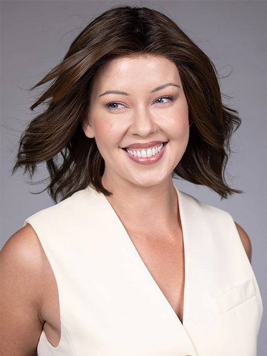 Model wearing CYRUS in color HAVANA BROWN R | A rich, medium neutral brown with minimal warm tones, offering a natural, sophisticated look. Softly rooted for added depth.