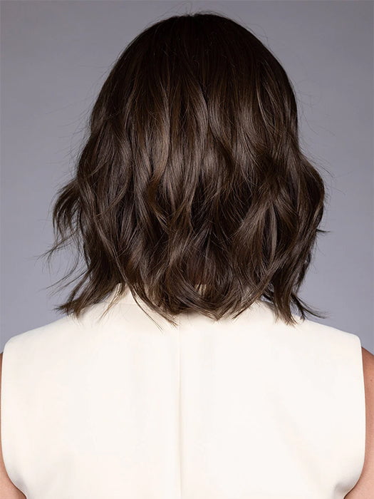 Model wearing CYRUS in color HAVANA BROWN R | A rich, medium neutral brown with minimal warm tones, offering a natural, sophisticated look. Softly rooted for added depth.