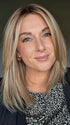 Ashley is wearing CHELSEA by BELLE TRESS in color RAW SUGAR BLONDE | A Neutral Light Blonde, Honey Blonde, Pale Gold Blonde, with a base of Light Brown Lowlights featuring a Medium Root Color