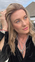 Jenny B. @thewiggygirl wearing COREY by ENVY in color SPARKLING CHAMPAGNE | Medium Brown roots with overall Strawberry Blonde base and soft Golden Blonde highlights