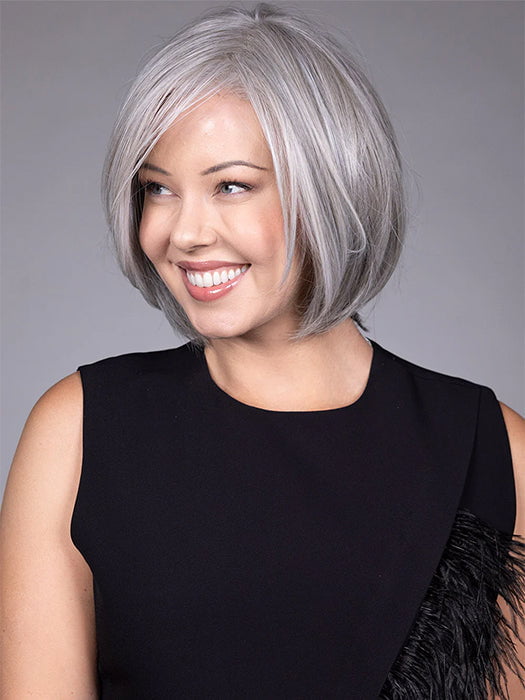 Model is wearing DION in color COCANUT MILK GREY R | Creamy, off-white tones with soft gray hues, creating a pearlescent or silvery finish.