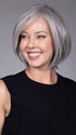 Model is wearing DION in color COCANUT MILK GREY R | Creamy, off-white tones with soft gray hues, creating a pearlescent or silvery finish.