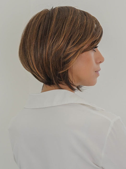 Model is wearing POISED by TRESSALLURE in color 17/23/R8 | Beige Blonde and Auburn Blended with Medium Brown Roots