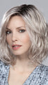 This synthetic wig has a monofilament part and extended lace front for a realistic appearance