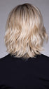Model is wearing ELSA by BELLETRESS in color BUTTERBEER R | Dark Brown Base and Root that transitions smoothly into a buttery blonde, infused with creamy honey and toffee tones