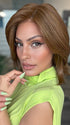 Model is wearing FARREN by AMORE in color BROWN-TOPAZ | Medium brown and light honey brown are carefully blended to create this warm-toned brunette shade. 