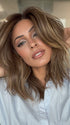 Roxie is wearing FENIX by ESTETICA in color CKISSRT4 | Golden Brown with Copper Blonde Highlights & Dark Brown Roots