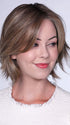 Model is wearing FERRARI By BELLETRESS in color SUNKISSED ALMOND R | A blend of Medium and Light Brown with Light Gold Blonde Highlights and a hint of Cooler Blonde, rooted with Medium and Light Brown