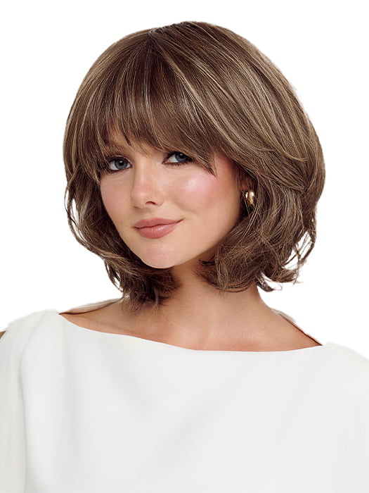Model is wearing FLAWLESS WAVES by TressAllure in 10/16/R8 | Dark roots fade into a beautiful blend of Medium Light Brown and Light Natural Blonde
