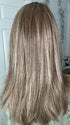 Emily H. @she_sheds_more wearing FORTE by BELLETRESS in color BROWN SUGAR COOKIE R | The roots are a Rich Brown Tone that seamlessly transitions into a Warm, Golden-Brown base. Delicate highlights in honey and toffee tones add dimension