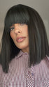 Model is wearing FRINGE EFFECT by HAIRDO in color R2 EBONY | Black