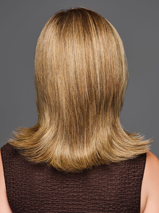 Model is wearing OWN THE ROOM LUXURY in color GF12-22 SS CAPPUCCINO | Light Golden Brown Evenly Blended with Cool Platinum Blonde Highlights with Dark Roots