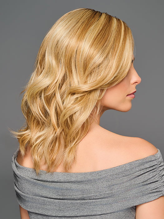 Model is wearing RAISE THE BAR in color GF14-22SS SS WHEAT| Dark Blonde Evenly Blended with Platinum Blonde with Dark Roots
