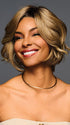 Model is wearing TREND ALERT LUXURY in color GF11-25 SS HONEY PECAN | Chestnut Brown base blends into multi-dimensional tones of Brown and Golden Blonde