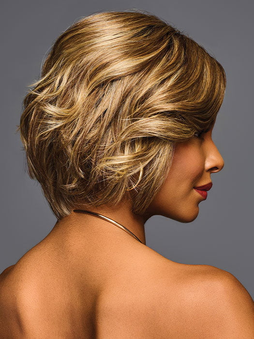 Model is wearing TREND ALERT LUXURY in color GF11-25 SS HONEY PECAN | Chestnut Brown base blends into multi-dimensional tones of Brown and Golden Blonde