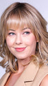 This mid-length layered wig features wispy bangs and a stunning curl pattern
