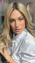 Model is wearing COREY by ENVY in color HONEY BREEZE | A blend of Cool, Honey Blonde and Multi-Dimensional Medium Brown with Darker Brown Roots