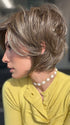 Model is wearing IVY by JON RENAU in shade 8RH14 MOUSSE CAKE | Medium Brown with 33% Medium Natural Blonde Highlights