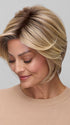 Model is wearing IVY in 12FS8 | SHADED PRALINE | Light Gold Brown, Light Natural Gold Blonde & Pale Natural Gold-Blonde Blend, Shaded with Medium Brown