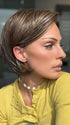 Model is wearing IVY by JON RENAU in shade 8RH14 MOUSSE CAKE | Medium Brown with 33% Medium Natural Blonde Highlights