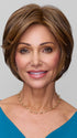 Model is wearing IVY in FS6/30/27 TOFFEE TRUFFLE | Brown, Medium Red-Gold, Medium Red-Gold Blonde Blend with Medium Red Gold Blonde Bold Highlights
