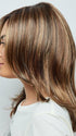 The fashion forward layers create volume that give you a salon blowout look