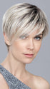 The pixie haircut features a longer fringe for a stylish hairstyle