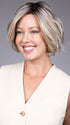 Model is wearing KATE by BELLETRESS in color BUTTERBEER R | Dark Brown Base and Root that transitions smoothly into a buttery blonde, infused with creamy honey and toffee tones