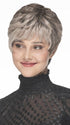 This pixie wig has a layered short top, textured fringe, and tapered back