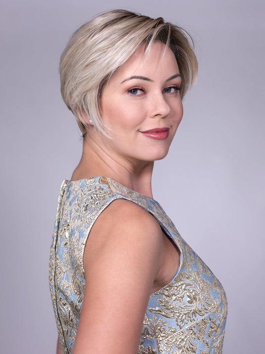 Model is wearing LENOX By BELLETRESS in CRUSHED-ALMOND-BLONDE-R | A Soft Neutral Light Blonde with a Light and Medium Blended Root Color