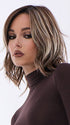 Model is wearing LORYN in SNOWY UMBER R | | Medium Ginger Brown base with White Blond highlights