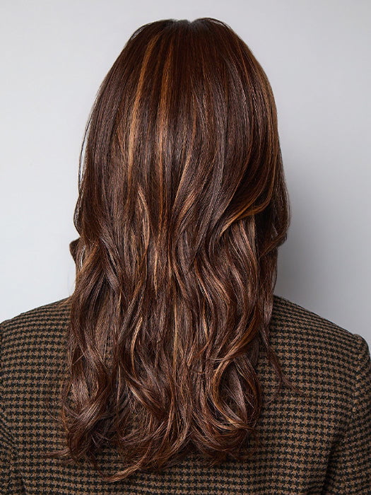 Model is wearing MARGO in color GLAZED AUBURN R | Stunning fusion of deep red, medium copper, and dark chocolate root.