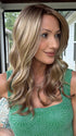 Jenna Fail @jenna_fail wearing MAYA HAND TIED by ENVY in color SPARKLING CHAMPAGNE | Medium Brown roots with overall Strawberry Blonde base and soft Golden Blonde highlights